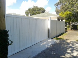 Wooden driveway gate with aluminium frame